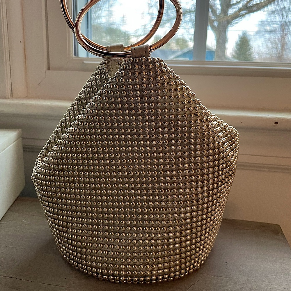 Super Cute Gold Olga Berg Bag. Never worn and in perfect condition.